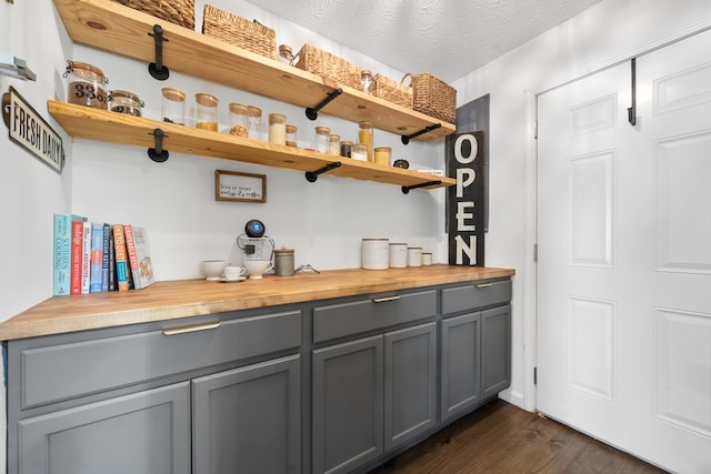 111 Southlake Dr, Eatonton, GA 31024 - bar with dark wood-style flooring