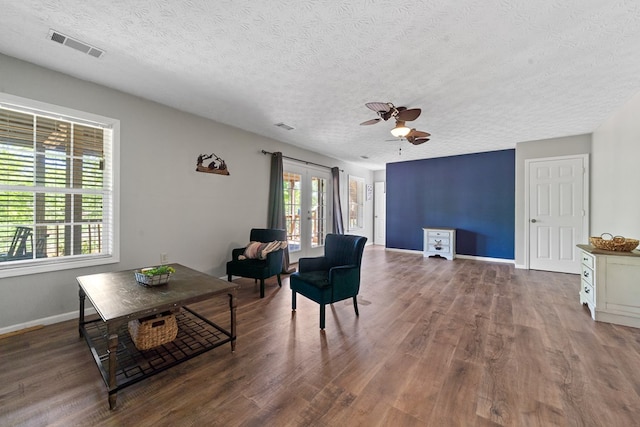 111 Southlake Dr, Eatonton, GA 31024 - sitting room with wood finished floors, a textured ceiling, ceiling fan, and visible vents