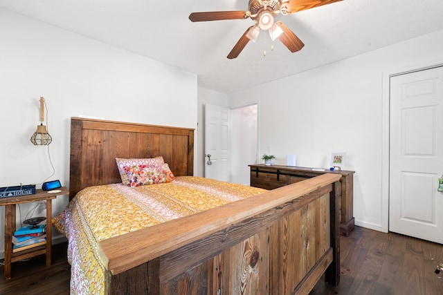 111 Southlake Dr, Eatonton, GA 31024 - bedroom featuring a ceiling fan, baseboards, and dark wood finished floors