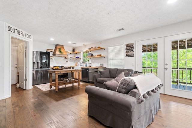 111 Southlake Dr, Eatonton, GA 31024 - living room featuring wood finished floors, visible vents, and recessed lighting