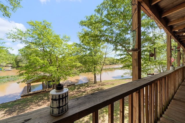 111 Southlake Dr, Eatonton, GA 31024 - wooden terrace with a water view