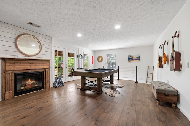 111 Southlake Dr, Eatonton, GA 31024 - rec room with a textured ceiling, wood finished floors, visible vents, and french doors