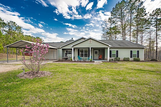 single story home with an attached garage, fence, driveway, a carport, and a front yard