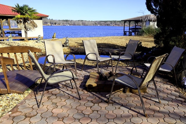 view of patio / terrace with a water view