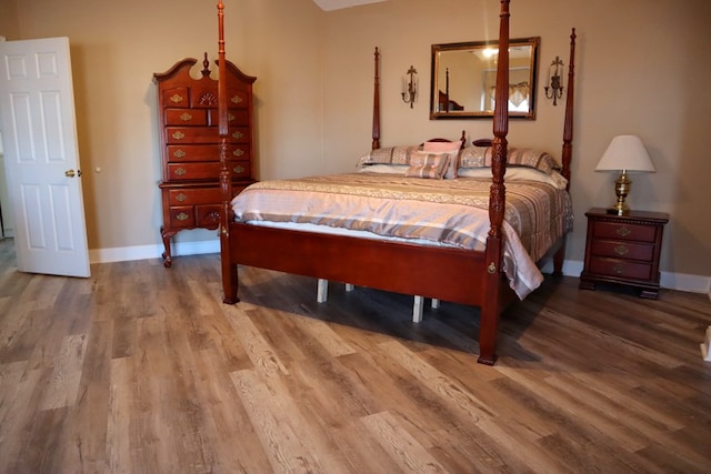 bedroom featuring hardwood / wood-style flooring