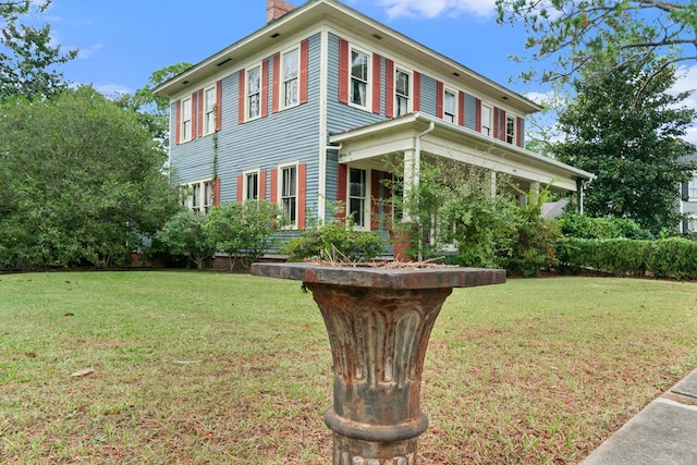 view of front facade featuring a front yard