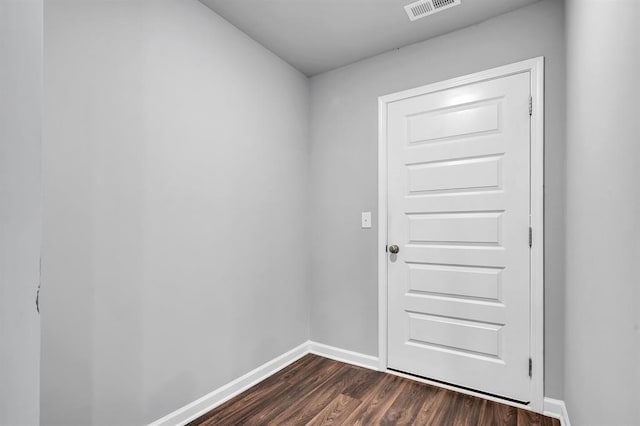 doorway featuring dark hardwood / wood-style floors