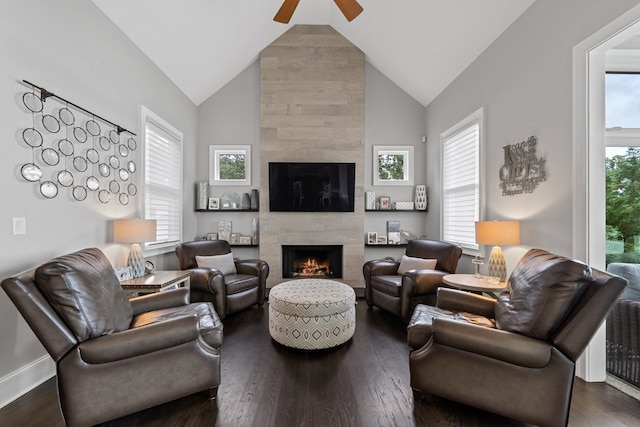 202 Jackson Rd, Milledgeville, GA 31061 - living room with ceiling fan, a tile fireplace, high vaulted ceiling, and dark wood-type flooring