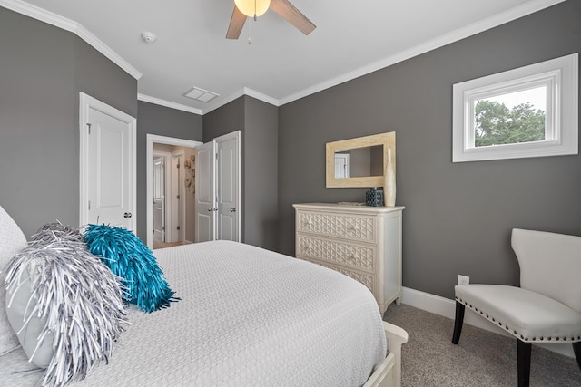 202 Jackson Rd, Milledgeville, GA 31061 - bedroom featuring ornamental molding, carpet floors, and ceiling fan