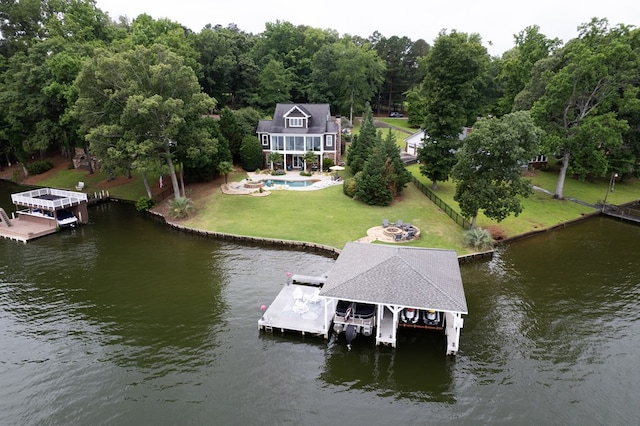 202 Jackson Rd, Milledgeville, GA 31061 - dock area with boat lift, a water view, and an outdoor pool
