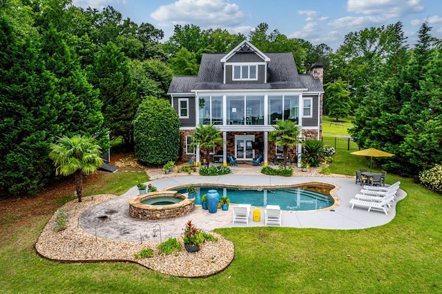 202 Jackson Rd, Milledgeville, GA 31061 - rear view of house featuring a patio area, french doors, a chimney, stone siding, and a pool with connected hot tub