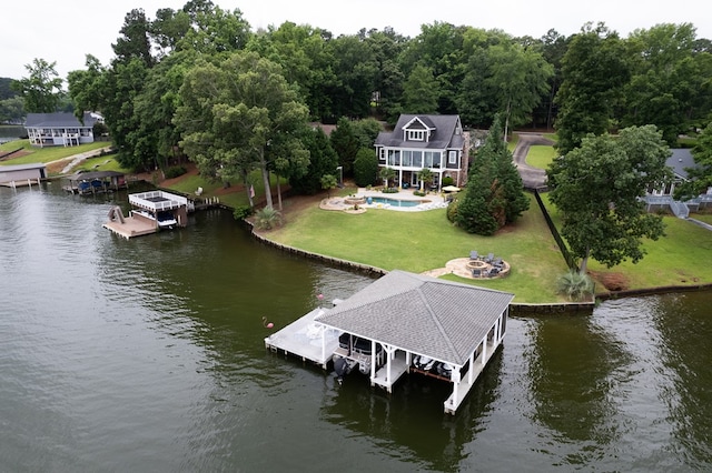 202 Jackson Rd, Milledgeville, GA 31061 - dock area with boat lift, a water view, and a yard