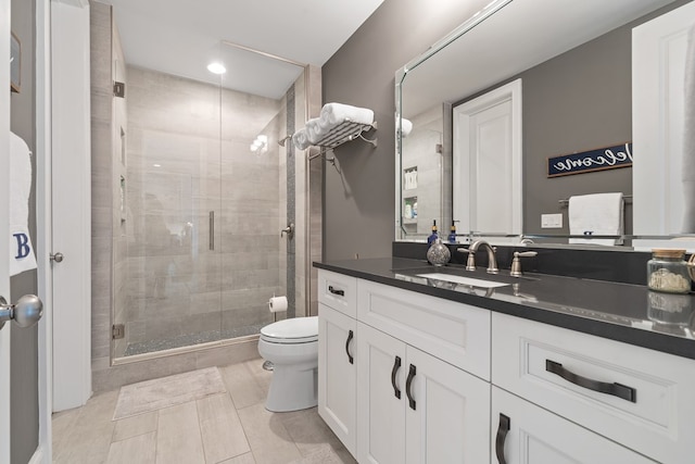 202 Jackson Rd, Milledgeville, GA 31061 - bathroom featuring a stall shower, vanity, tile patterned flooring, and recessed lighting