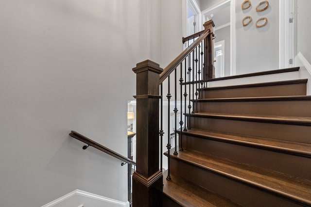 202 Jackson Rd, Milledgeville, GA 31061 - staircase featuring baseboards