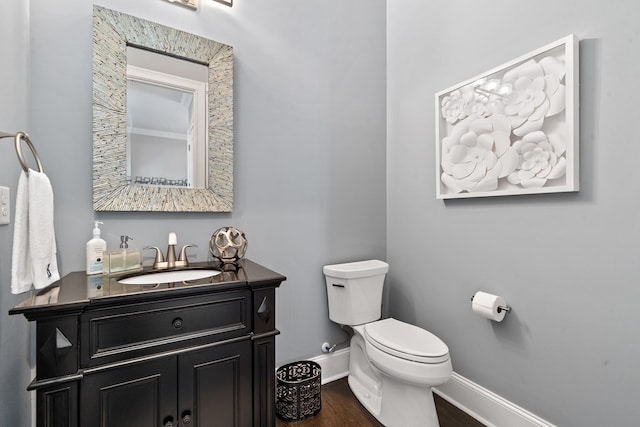 202 Jackson Rd, Milledgeville, GA 31061 - half bath featuring vanity and wood finished floors