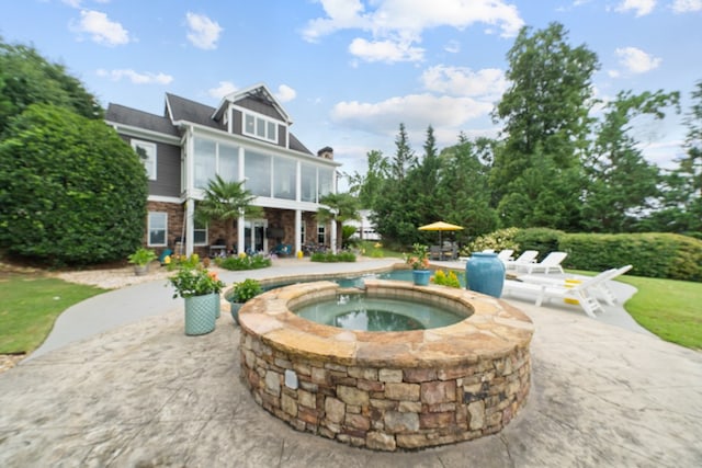 202 Jackson Rd, Milledgeville, GA 31061 - view of home's community featuring a hot tub and a patio