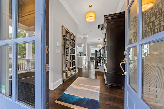 202 Jackson Rd, Milledgeville, GA 31061 - foyer entrance with ornamental molding, dark wood-style flooring, healthy amount of natural light, and stairway