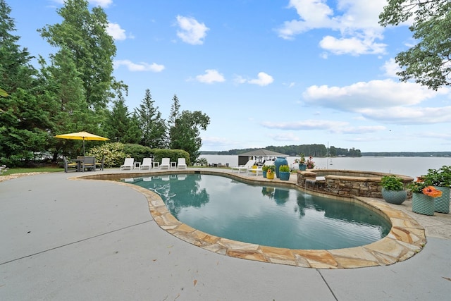 202 Jackson Rd, Milledgeville, GA 31061 - view of pool featuring a patio, a pool with connected hot tub, and a water view