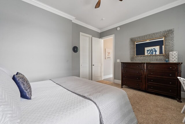 202 Jackson Rd, Milledgeville, GA 31061 - bedroom featuring light colored carpet, ornamental molding, and ceiling fan
