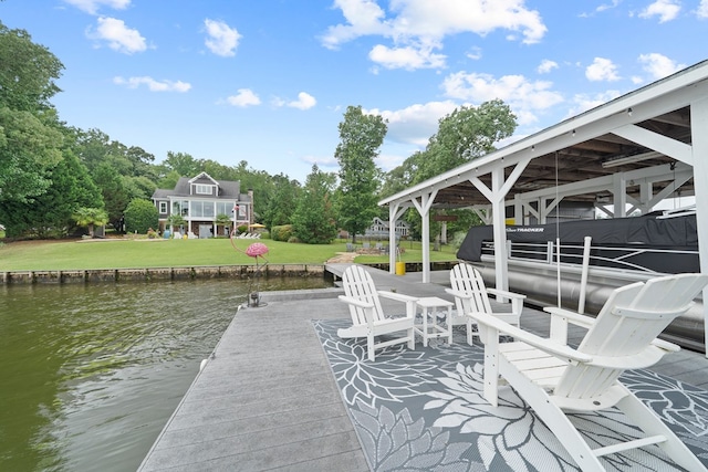 202 Jackson Rd, Milledgeville, GA 31061 - dock area featuring a water view, boat lift, and a yard