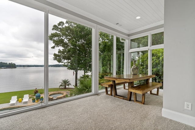 202 Jackson Rd, Milledgeville, GA 31061 - sunroom featuring carpet floors, a water view, crown molding, and healthy amount of natural light
