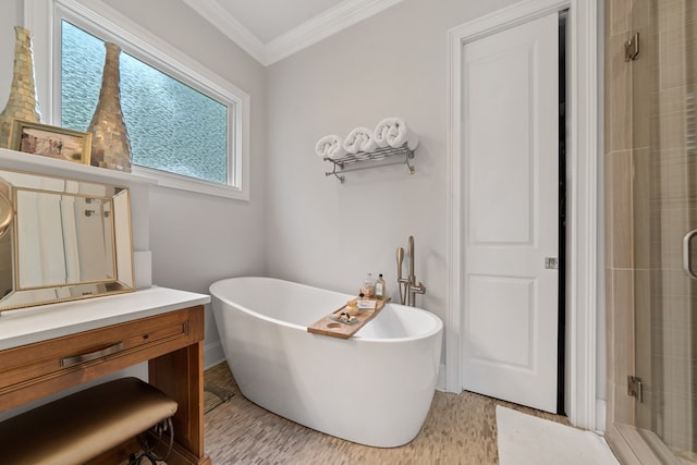 202 Jackson Rd, Milledgeville, GA 31061 - bathroom with a shower stall, a freestanding tub, crown molding, and vanity