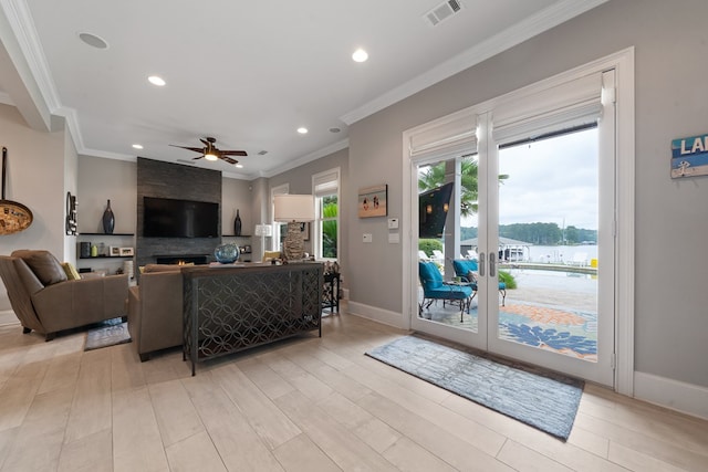 202 Jackson Rd, Milledgeville, GA 31061 - living area with ceiling fan, recessed lighting, ornamental molding, light wood finished floors, and a fireplace
