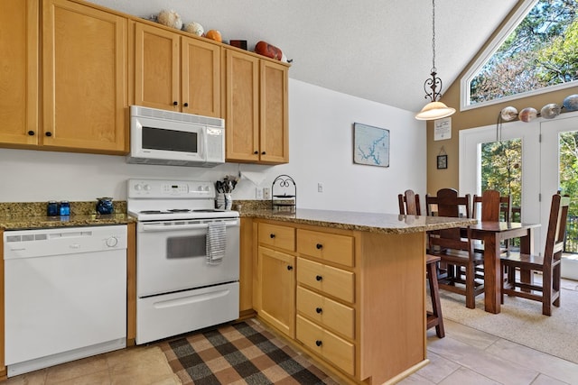 kitchen with kitchen peninsula, white appliances, a textured ceiling, vaulted ceiling, and pendant lighting