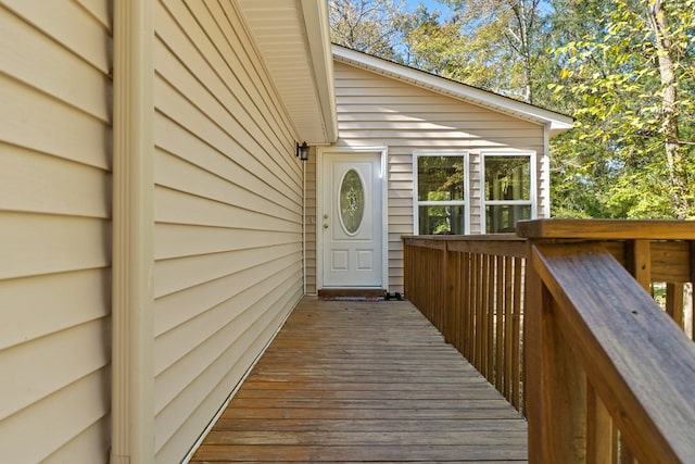 doorway to property with a wooden deck