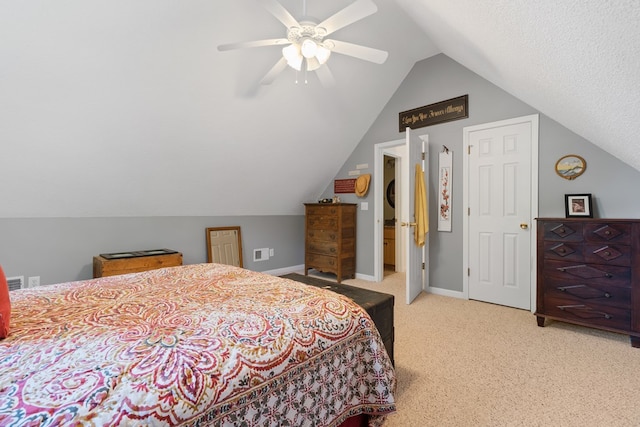 bedroom with ceiling fan, light colored carpet, and lofted ceiling