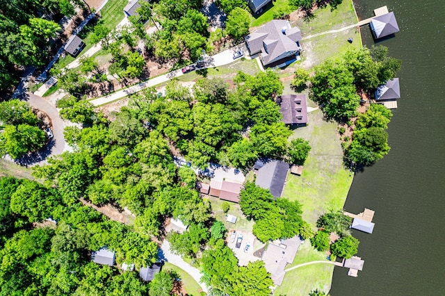 aerial perspective of suburban area featuring a nearby body of water