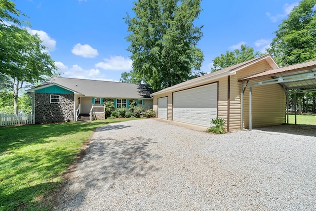 ranch-style house with a garage and stone siding