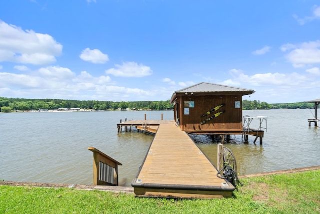 dock area with a water view