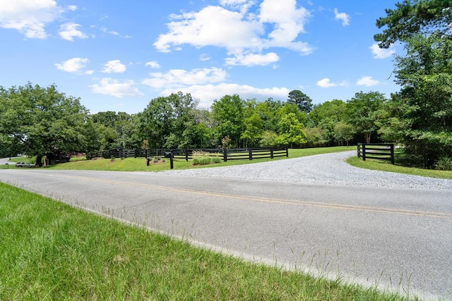 2163 N Jefferson St, Milledgeville, GA 31061 - view of asphalt road featuring a forest view