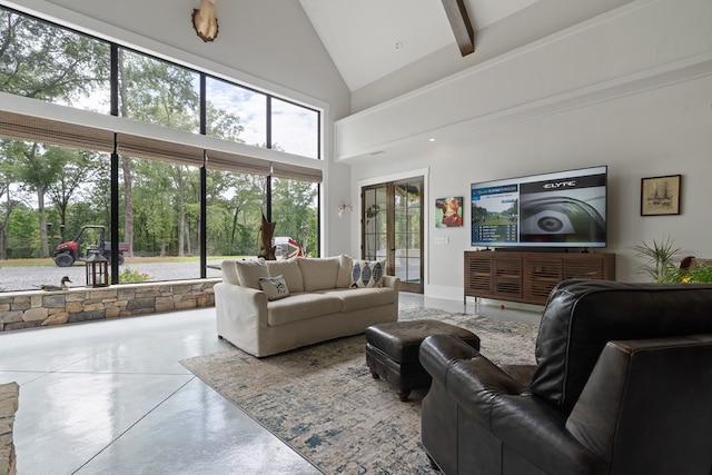 2163 N Jefferson St, Milledgeville, GA 31061 - living area with high vaulted ceiling, healthy amount of natural light, and finished concrete flooring