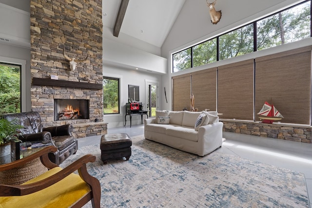 2163 N Jefferson St, Milledgeville, GA 31061 - living area featuring a stone fireplace, high vaulted ceiling, and beamed ceiling