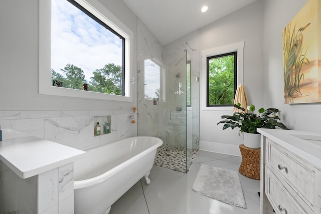2163 N Jefferson St, Milledgeville, GA 31061 - bathroom with a marble finish shower, a soaking tub, vanity, and recessed lighting