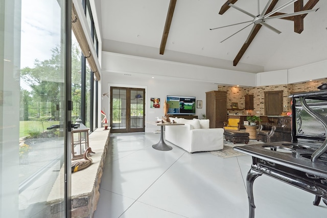 2163 N Jefferson St, Milledgeville, GA 31061 - living room with french doors, high vaulted ceiling, concrete floors, and beam ceiling