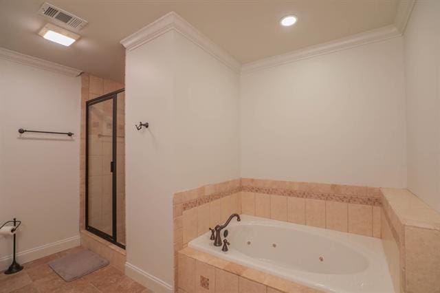 bathroom with visible vents, crown molding, a whirlpool tub, a stall shower, and tile patterned floors