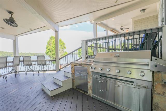 wooden deck with area for grilling