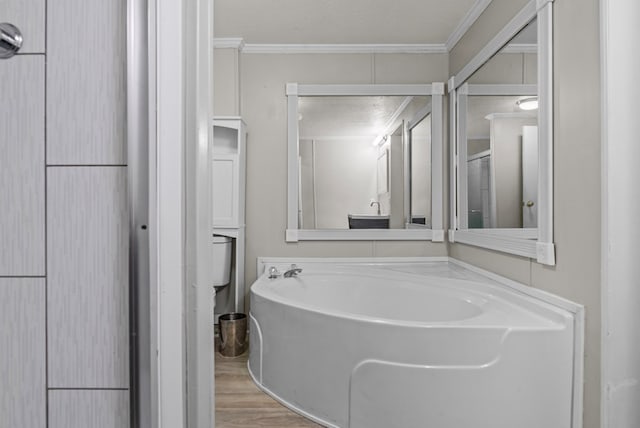 bathroom with a textured ceiling, wood-type flooring, crown molding, and walk in shower