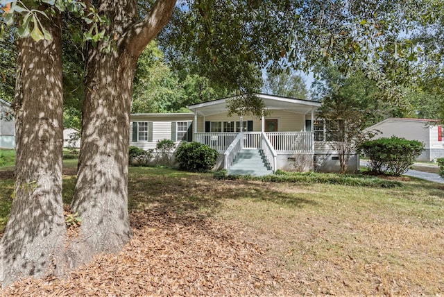 view of front of property with covered porch and a front yard