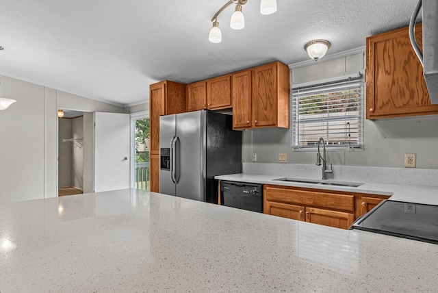 kitchen with stainless steel refrigerator with ice dispenser, a textured ceiling, crown molding, sink, and dishwasher