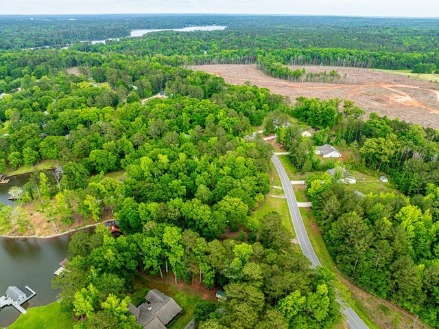 154 Old Plantation Trl, Milledgeville, GA 31061 - aerial overview of property's location with a heavily wooded area and a nearby body of water