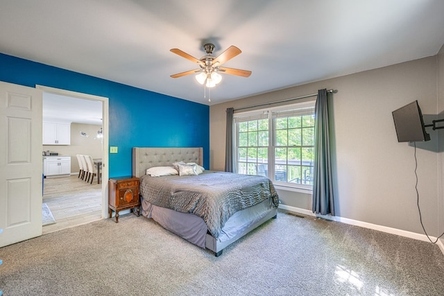 154 Old Plantation Trl, Milledgeville, GA 31061 - bedroom featuring light carpet, baseboards, and ceiling fan