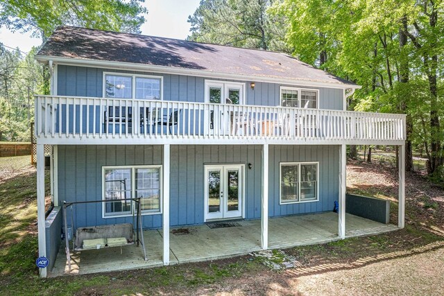 154 Old Plantation Trl, Milledgeville, GA 31061 - back of house featuring french doors, a patio area, and a balcony