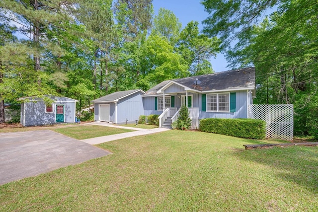 154 Old Plantation Trl, Milledgeville, GA 31061 - single story home featuring an outdoor structure, a garage, a front yard, and a porch