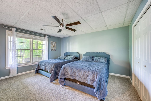 154 Old Plantation Trl, Milledgeville, GA 31061 - carpeted bedroom with a paneled ceiling, ceiling fan, baseboards, and a closet