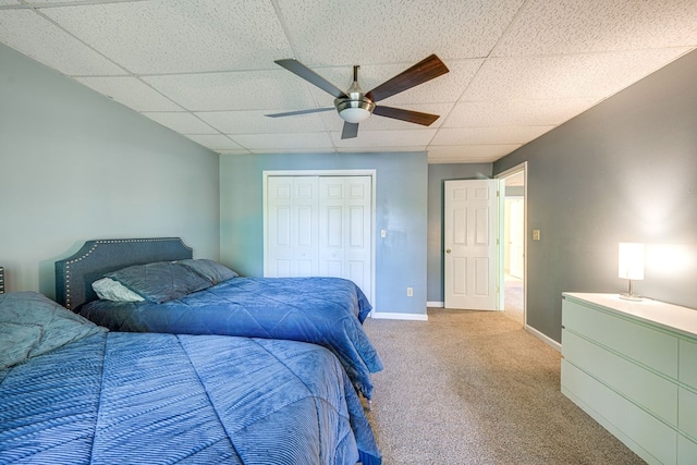 154 Old Plantation Trl, Milledgeville, GA 31061 - carpeted bedroom featuring a drop ceiling, a closet, baseboards, and ceiling fan