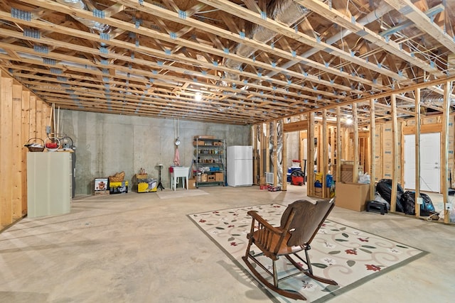 411 Rockville Rd, Eatonton, GA 31024 - below grade area featuring freestanding refrigerator